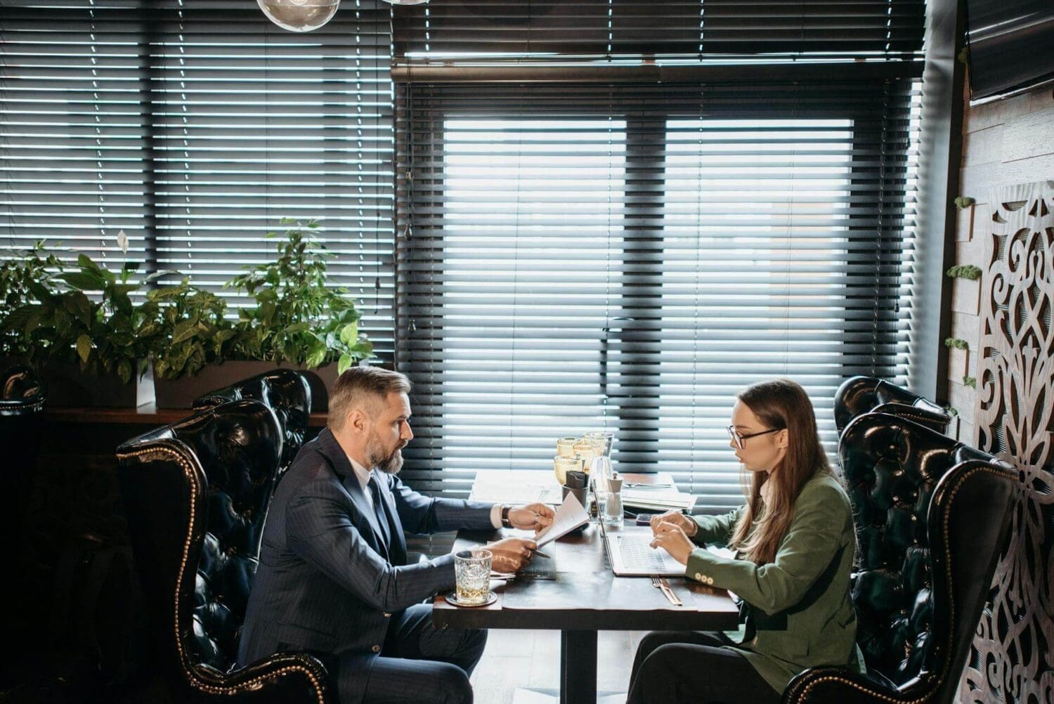 Insurane agent talking with restaurant owners in Arkansas