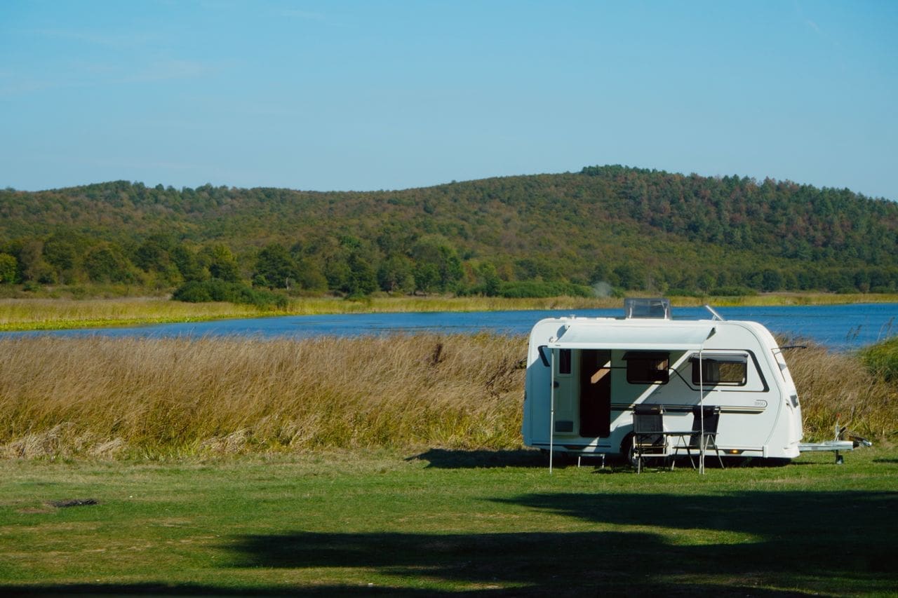 Recreational vehicle with awning at campsite in Little Rock, AR